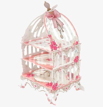 Bild av charmigt kakfat som fågelbur i rosa nyans