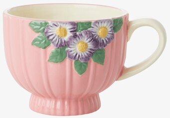 Bild av keramikmugg med rosa blommor och krämhandtag