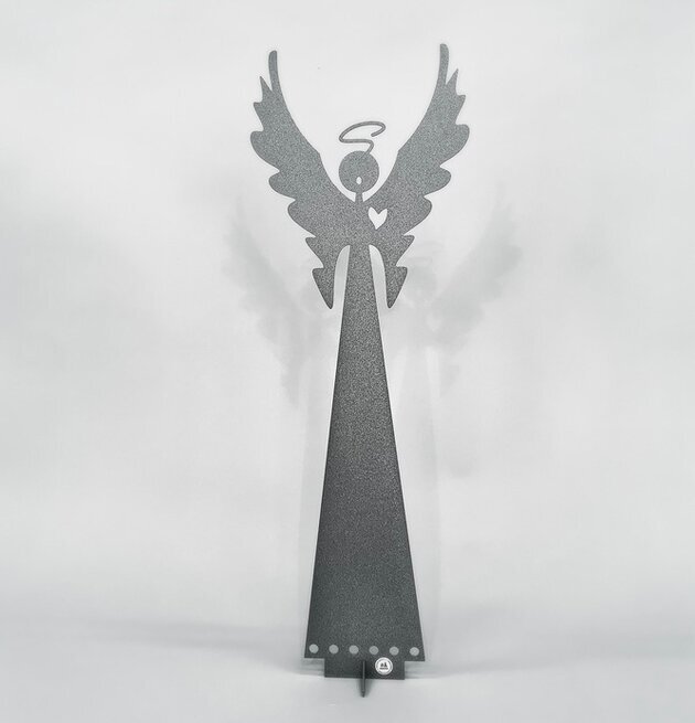 Bild av stiliserad ängel med betongliknande yta