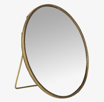 Bild av rund spegel med mässingsfinish och metallstöd