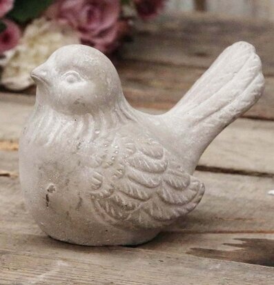 Bild av dekorativ fågel med rustik och naturlig charm