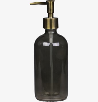 Bild av elegant glasflaska med pump för inredning