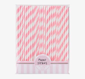 Bild av papperssugrör med rosa och vitt spiraldesign