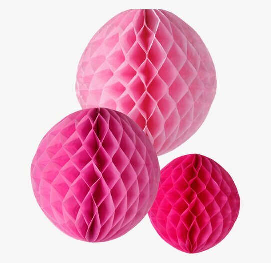 Bild av tre rosa dekorativa pappersbollar i harmoni
