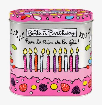 Foto av en färgglad och festlig plåtburk med design