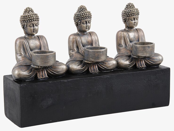 Bild av elegant ljushållare med Buddha-figurer