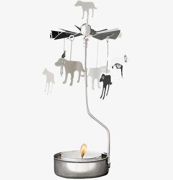 Bild av dekorativt änglaspel med hundmotiv och ljus