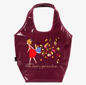 Bild av färgglad shoppingväska med frukter och bakverk