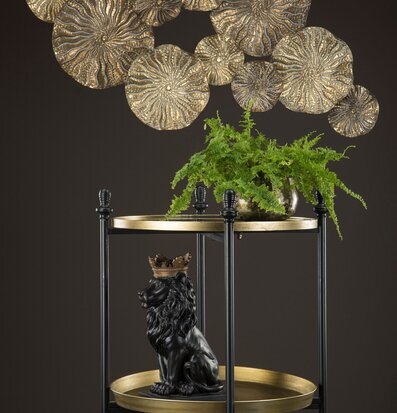 Bild av elegant inredning med lejon och växt