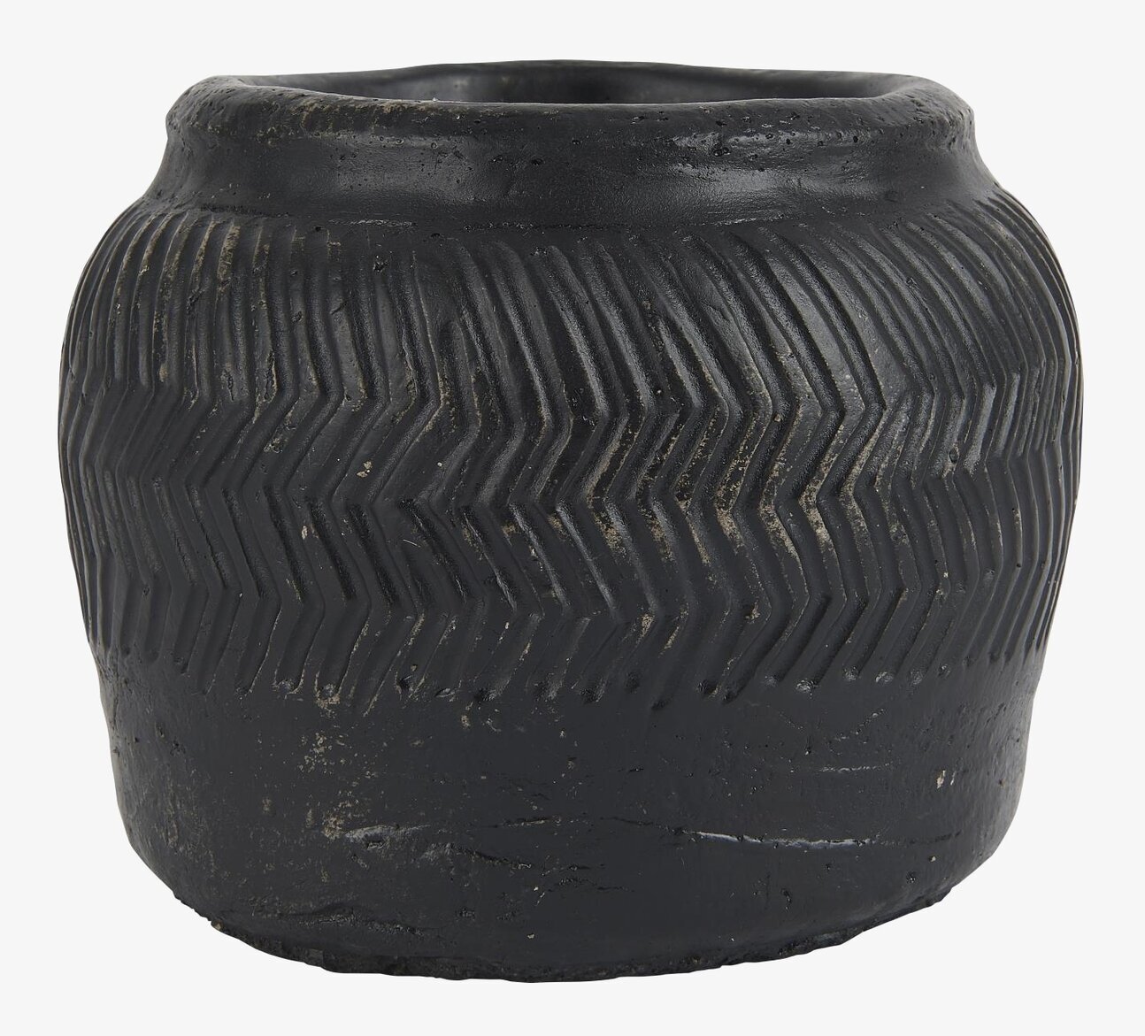 Foto av unik kruka med zig-zag-mönster och matt finish