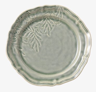 Foto av tallrik med arabesque-mönster och grön glasyr