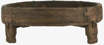 Bild av ett unikt lågt träbord med hantverksdetaljer