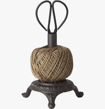 Bild av rustik trådhållare med sax och snöre