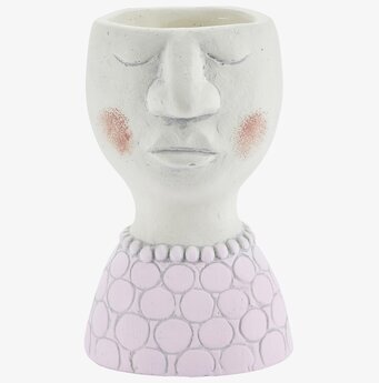 Bild av unik blomkruka med ansikte i lila nyans