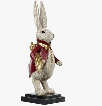 Bild av elegant kaninfigur i röd jacka och guldparaply