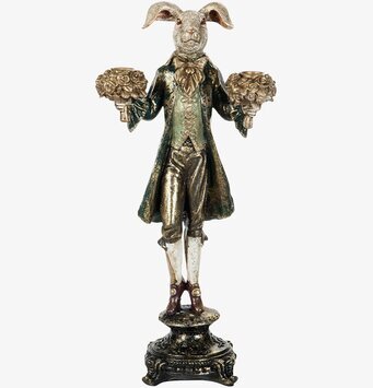 Foto av en kaninformad ljusstake i mörkgrön nyans