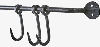 Bild av robust väggskena med krokar för organisering