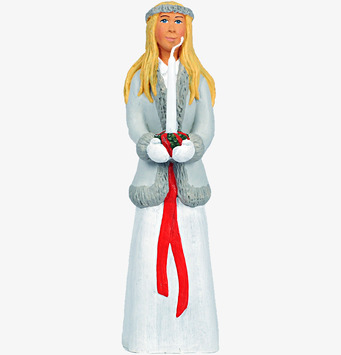 Bild av luciatärna i traditionell svensk julklädsel