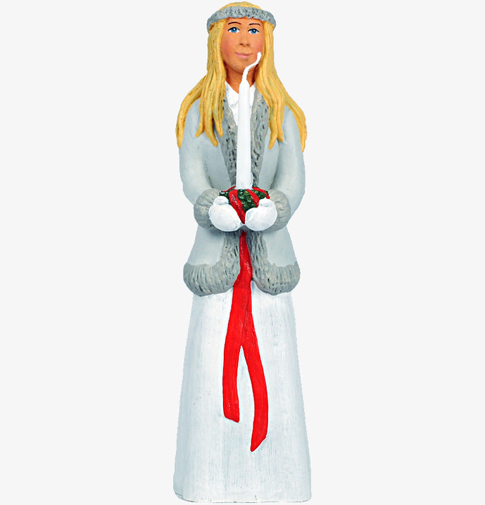 Tärna Lisa från Sverigealmanackan i traditionell luciaklädsel