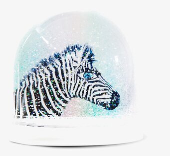 Bild av snöglob med zebra och glittrande detaljer