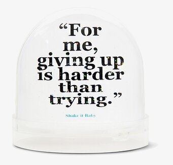 Bild av inspirerande snöglob med citat och design