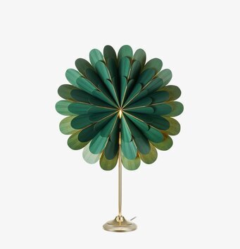 Bild av stilren och dekorativ bordsstjärna i grönt
