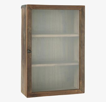 Bild av rustikt väggskåp med glasdörr och trädetaljer