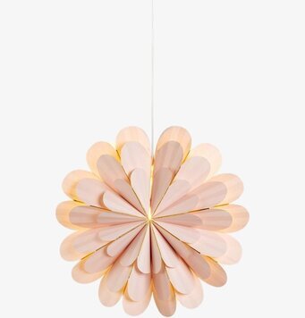 Bild av rosa hängande pappersstjärna i harmonisk design