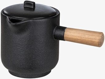 Bild av kanna med minimalistisk design och trähandtag