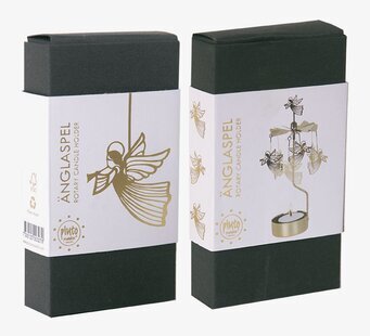 Bild av elegant förpackning med flygande ängelmotiv
