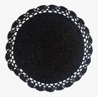 Bild av stilren rund bordstablett med dekorativ kant