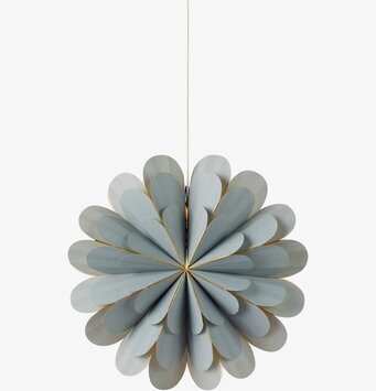 Bild av dekorativ grå stjärna med gyllene detaljer