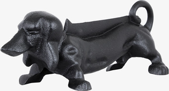 Foto av fotskrapa i form av en tax i robust järn