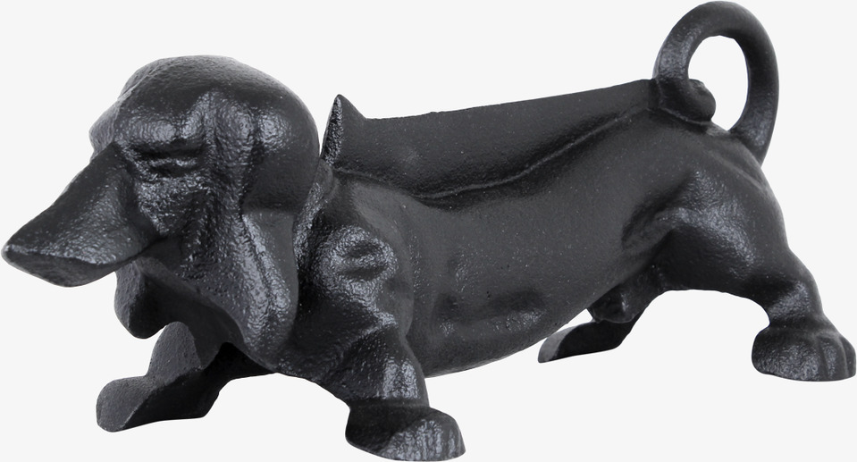 Foto av fotskrapa i form av en tax i robust järn