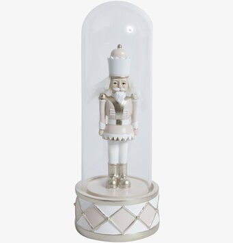 Bild av dekorativ nötknäppare i rosa och guld