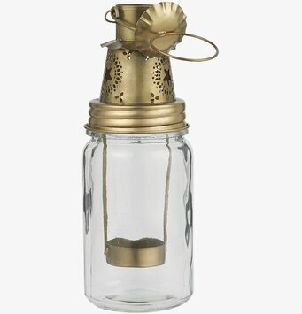 Foto av elegant hängande ljuslykta i guldtoner