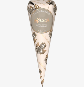 Bild av elegant designad chokladstrut i beige toner