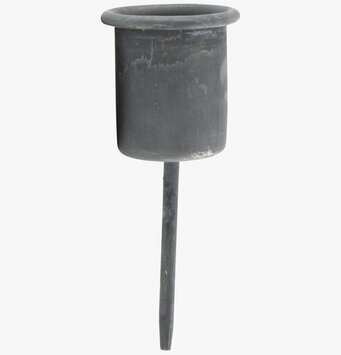 Bild av stilren ljushållare i metall med rå design