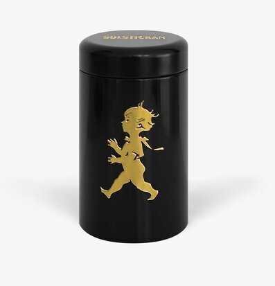 Foto av elegant tändsticksrör i svart och guld