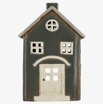 Bild av dekorativ ljuslykta formad som liten husfasad