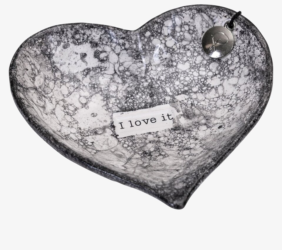 Bild av hjärtformad skål med bubbligt mönster