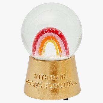 Bild av unik snöglob med musik och regnbågsdesign