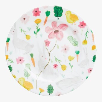 Bild av somrig assiett med djur- och blomstermotiv