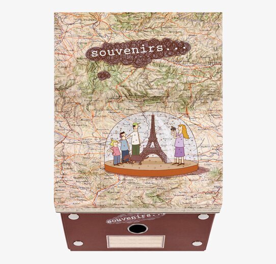 Bild av kreativ förvaringsbox med kartdesign och snöglob