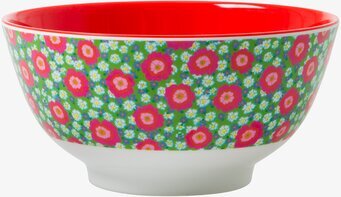 Bild av färgglad melaminskål med blommönster och röd insida