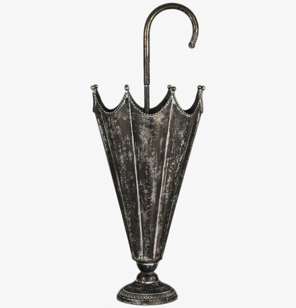 Bild på unikt paraplyställ med antik design och finish