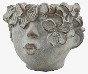 Bild av konstnärlig kruka med skulpturala detaljer