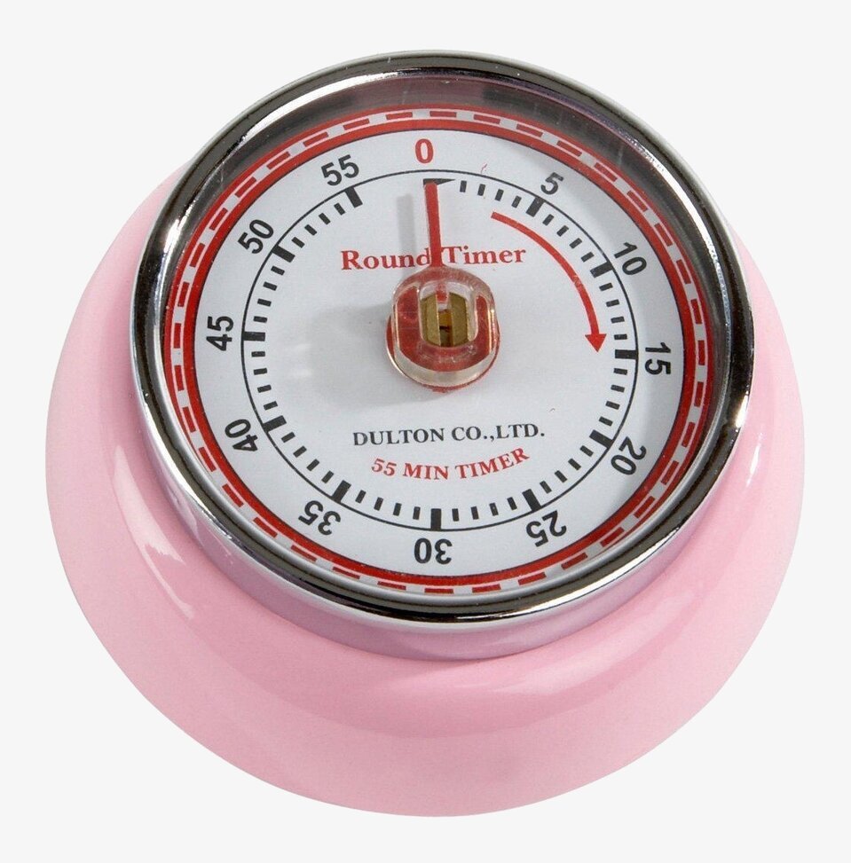 Bild av rosa kökstimer med analog urtavla och metallkant