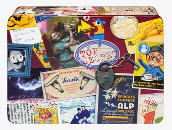 Bild av vintage-inspirerad plåtburk med hemligt tema