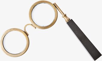 Bild av elegant förstoringsglas i guld och svart